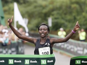 Mary Keitany, 25, of Kenya, crosses the finish line to win the women's division of the 20th annual TD Beach To Beacon 10K road race Saturday, Aug. 5, 2017 in Cape Elizabeth, Maine. (AP Photo/Joel Page)