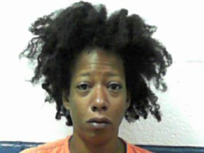 This Aug. 7, 2017 photo made available by the West Virginia Regional Jail & Correctional Facility Authority, shows Erica Newsome under arrest. Newsome was charged with concealing the body of her 11-year-old daughter in her car as she was driving towards Buffalo, NY. Authorities say the Florida girl was already dead before the mother was involved in a car crash in West Virginia. (West Virginia Regional Jail & Correctional Facility Authority via AP)