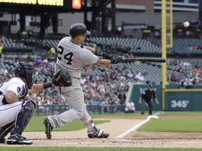 New York Yankees' Gary Sanchez connects for a two-run home run during the first inning of a baseball game against the Detroit Tigers, Tuesday, Aug. 22, 2017, in Detroit. (AP Photo/Carlos Osorio)