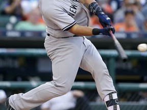New York Yankees' Gary Sanchez hits a solo home run against the Detroit Tigers during the first inning of a baseball game Wednesday, Aug. 23, 2017, in Detroit. (AP Photo/Duane Burleson)