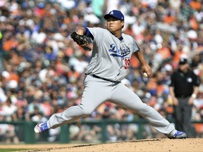 Los Angeles Dodgers starting pitcher Hyun-Jin Ryu throws  in the second inning of a baseball game against the Detroit Tigers, Saturday, Aug. 19, 2017, in Detroit. (AP Photo/Lon Horwedel)