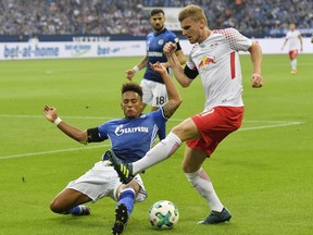 Leipzig's Timo Werner, right, and Schalke's Thilo Kehrer challenge for the ball during the German Bundesliga soccer match between FC Schalke 04 and RB Leipzig at the Arena in Gelsenkirchen, Germany, Saturday Aug. 19, 2017. (AP Photo/Martin Meissner)