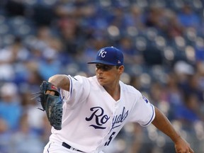 Kansas City Royals pitcher Jason Vargas throws to a batter in the first inning of a baseball game against the Tampa Bay Rays at Kauffman Stadium in Kansas City, Mo., Wednesday, Aug. 30, 2017. (AP Photo/Colin E. Braley)