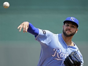 Kansas City Royals starting pitcher Jake Junis throws during the first inning of a baseball game against the Colorado Rockies Thursday, Aug. 24, 2017, in Kansas City, Mo. (AP Photo/Charlie Riedel)