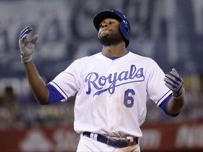 Kansas City Royals' Lorenzo Cain celebrates after hitting an RBI single during the seventh inning of the team's baseball game against the Seattle Mariners Thursday, Aug. 3, 2017, in Kansas City, Mo. The Royals won 6-4. (AP Photo/Charlie Riedel)