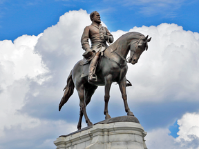 A statue of Confederate Gen. Robert E. Lee that stands in the middle of a traffic circle on Monument Avenue in Richmond, Virginia.