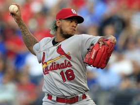 St. Louis Cardinals starting pitcher Carlos Martinez delivers to a Kansas City Royals batter during the first inning of a baseball game at Kauffman Stadium in Kansas City, Mo., Monday, Aug. 7, 2017. (AP Photo/Orlin Wagner)
