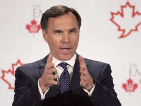 Finance Minister Bill Morneau addresses The Canadian Club of Toronto and The Empire Club regarding Budget 2017 in Toronto on Friday March 24, 2017.