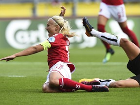 Denmark's Pernille Harder tumbles on the field during the Women's Euro 2017 semifinal soccer match between Denmark and Austria in Breda, the Netherlands Thursday, Aug. 3, 2017. (AP Photo/Ermindo Armino)