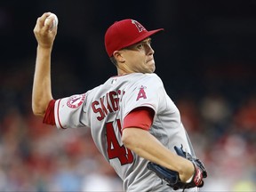 Los Angeles Angels starting pitcher Tyler Skaggs (45) throws during the first inning of a baseball game against the Washington Nationals, Tuesday, Aug. 15, 2017, in Washington. (AP Photo/Carolyn Kaster)