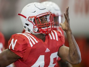 In this Aug. 3, 2017 photo, Nebraska defensive back Joshua Kalu warms up exercises at the start of NCAA college football preseason practice in Lincoln, Neb. Kalu, who started at cornerback the last two seasons, moved to safety in the spring and already has received eyebrow-raising praise from defensive coordinator Bob Diaco. (AP Photo/Nati Harnik)