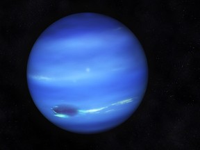 An image of Neptune, which is 17 times the mass of Earth and has oceans that are crushed by pressures millions of times more intense than the air pressure at Earth's sea level.