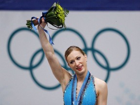 Canadian Joannie Rochette celebrates winning a bronze medal at the 2010 Winter Olympics in Vancouver. Rochette was one of eight named to the Skate Canada Hall of Fame on Monday.