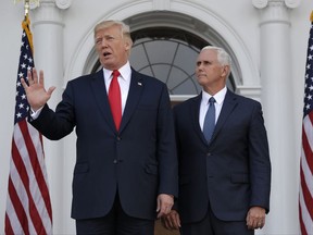 President Donald Trump, accompanied by Vice President Mike Pence speaks before a security briefing at Trump National Golf Club in Bedminster, N.J., Thursday, August 10, 2017,  (AP Photo/Evan Vucci)