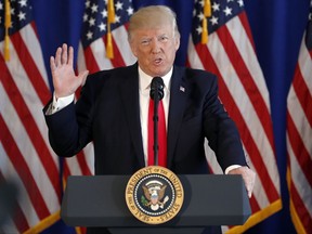 President Donald Trump speaks about the ongoing situation in Charlottesville, Va., at Trump National Golf Club, Saturday, Aug. 12, 2017, in Bedminster, N.J. (AP Photo/Pablo Martinez Monsivais)