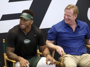 New York Jets' Jamal Adams, left, and NFL commissioner Roger Goodell take questions from fans as part a of fan forum during a NFL football training camp in Florham Park, N.J., Monday, July 31, 2017. (AP Photo/Seth Wenig)