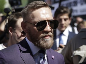 Conor McGregor leaves the stage during the arrivals for a boxing match Tuesday, Aug. 22, 2017, in Las Vegas. McGregor is scheduled to fight Floyd Mayweather Jr. in a boxing match Saturday in Las Vegas. (AP Photo/John Locher)
