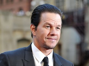 FILE - In this Tuesday, June 20, 2017 file photo,Mark Wahlberg attends the U.S. premiere of "Transformers: The Last Knight" at the Civic Opera House on in Chicago. Wahlberg outmuscled Dwayne Johnson to become Hollywood's highest-paid actor in the past year with a transforming income of $68 million, according to Forbes magazine. The former rapper and underwear model known as Marky Mark beat out "Baywatch" star Johnson with $65 million and The Rock's "The Fate of the Furious" co-star Vin Diesel worth $54.5 million(Photo by Rob Grabowski/Invision/AP)