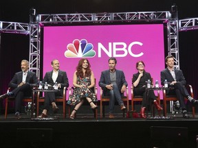 FILE - In this Aug. 3, 2017 file photo, Co-creator/executive producers David Kohan, from left, and Max Mutchnick and actors Debra Messing, Eric McCormack, Megan Mullally and Sean Hayes participate in the "Will & Grace" panel during the NBC Television Critics Association Summer Press Tour at the Beverly Hilton in Beverly Hills, Calif.  The parent company of New York's Tribeca Film Festival is giving TV its own show. Tribeca Enterprises said Wednesday, aug. 16  it will launch the stand-alone Tribeca TV Festival this fall. Scheduled highlights include a conversation with "Will & Grace" stars Debra Messing, Eric McCormack, Sean Hayes and Megan Mullally ahead of this fall's NBC reboot.(Photo by Willy Sanjuan/Invision/AP)