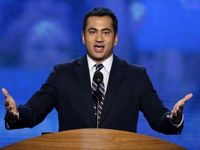 FILE - In this Sept. 4, 2012 file photo, Actor Kal Penn addresses the Democratic National Convention in Charlotte, N.C.  Penn, artist Chuck Close and virtually the entire membership of the President's Committee On the Arts and Humanities have announced their resignation. In a letter released this week, Aug. 18, 2017,  17 committee members cited the "false equivalence" of President Donald Trump's comments about last weekend's "Unite the Right" gathering in Charlottesville, Va. (AP Photo/J. Scott Applewhite)