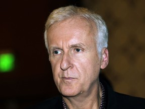 FILE - In this Sept 15, 2015 file photo, Oscar-winning director James Cameron attends the U.S. China Climate Leaders Summit in Los Angeles. Cameron has taken time out from crafting the upcoming four "Avatar" sequels to return to one of his old films, one he says is as up-to-the-minute as ever "Terminator 2: Judgment Day." Cameron converted the 26-year-old film into a 3D format that hits movie theaters Aug. 25, 2017.  It arrives just as escalating tensions over North Korea's nuclear ambitions are in the headlines.(AP Photo/Nick Ut)