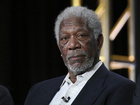 FILE - In this Jan. 6, 2016, file photo, actor Morgan Freeman participates in the "The Story of God" panel at the National Geographic Channel 2016 Winter TCA in Pasadena, Calif.  Freeman will receive the SAG Life Achievement Award at next year's Screen Actors Guild Awards ceremony. The actors union announced Tuesday, Aug. 22, 2017,  that Freeman will accept its highest honor on Jan. 21, 2018.  (Photo by Richard Shotwell/Invision/AP, File)