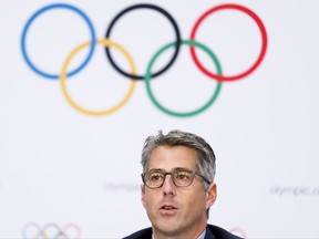 FILE - In this July 11, 2017 file photo, Casey Wasserman chairman of Los Angeles 2024, answers questions during a news conference after the presentation of Los Angeles 2024 Candidate City Briefing for International Olympic Committee (IOC) Members, at the SwissTech Convention Centre, in Lausanne, Switzerland. Over the next five weeks, leaders from LA and the U.S. Olympic Committee have to iron out financial details about their joint marketing agreement that will figure heavily into the USOC's ability to fund its athletes and sports organizations through those 2028 Games. Sorting out the agreement is one of the biggest hurdles to clear before the IOC meets the week of Sept. 11 in Lima, Peru, to approve Paris to host the 2024 Olympics and Los Angeles for 2028.(Valentin Flauraud/Keystone via AP)