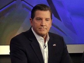 FILE - In this July 22, 2015 file photo, co-host Eric Bolling appears on "The Five" television program, on the Fox News Channel, in New York. Fox News announced on Saturday, Aug. 5, 2017, that Bolling has been suspended while it investigates a report that "The Specialists" co-host sent at least three female colleagues a lewd text message. Bolling's lawyer calls the accusations untrue and says he and his client are cooperating with the investigation.  (AP Photo/Richard Drew, File)