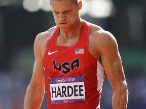 FILE - In this Aug. 9, 2012, file photo, United States' Trey Hardee reacts after competing in a 110-meter hurdles heat of the decathlon at the 2012 Summer Olympics in London. Hardee wants to set the record straight: No, he's not retired. Never has been. The two-time world champion decathlete understands why everyone may have jumped to that conclusion. He's 33, has been sidelined by an assortment of injuries and did some broadcasting work for the Rio de Janeiro Olympics. (AP Photo/Anja Niedringhaus, File)