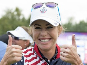 FILE - In this Sept. 20, 2015, file photo, Paula Creamer celebrates at the Solheim Cup golf tournament in St. Leon-Rot, southern Germany, after defeating Germany's Sandra Gal.  After making the U.S. team for the Solheim Cup six times in a row, Paula Creamer lost her spot. But captain Juli Inkster gave Creamer a reprieve as an alternate, and she'll head into this weekend's tournament looking to find her game again. (AP Photo/Jens Meyer, File)