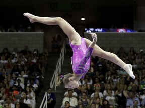 FILE - In this July 10, 2016, file photo, Ragan Smith competes on the balance beam during the U.S. Olympic gymnastics trials in San Jose, Calif. This weekend marks the first time since 1985 that no one on the previous Olympic team returned to compete the following year, leaving the stage to Smith and the next wave in a program that plans to keep on rolling with Valeri Liukin taking over for retired national coordinator Martha Karolyi. (AP Photo/Gregory Bull, File)