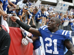 FILE - In this Sunday, Sept. 27, 2015 file photo, Indianapolis Colts cornerback Vontae Davis (21) gives his gloves to a fan after an NFL football game against the Tennessee Titans in Nashville, Tenn. Two-time Pro Bowl cornerback Vontae Davis is listed as week to week after coach Chuck Pagano said he was diagnosed with a "pretty significant" groin injury, Tuesday, Aug. 29, 2017. (AP Photo/Weston Kenney, File)