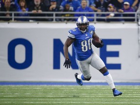 FILE - In this Nov. 24, 2016, file photo, Detroit Lions wide receiver Anquan Boldin (80) runs the ball against the Minnesota Vikings during an NFL football game in Detroit. The Buffalo Bills have signed free agent Anquan Boldin in a move that adds a veteran presence to a mostly young and untested group of receivers. The Bills announced the signing following practice at training camp on Monday, Aug. 7, 2017, and two weeks after Boldin traveled to Buffalo to meet with team officials. (AP Photo/Rick Osentoski, File)