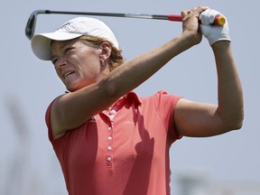 FILE - In this June 4, 2016, file photo, Catriona Matthew, of Scotland, hits a tee shot on the seventh hole of the second round of the ShopRite LPGA Classic golf tournament, in Galloway Township, N.J. European golfer Suzann Pettersen has pulled out of this weekend's Solheim Cup because of a back injury. Pettersen, who has 12 top-20 finishes and a win this season on the LPGA Tour, will be replaced by alternate Catriona Matthew. (AP Photo/Mel Evans, File)