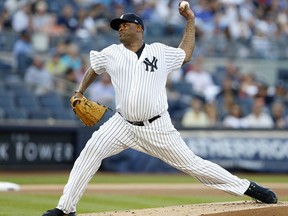 FILE - In this Aug. 1, 2017, file photo, New York Yankees starting pitcher CC Sabathia winds up during the first inning of the team's baseball game against the Detroit Tigers, at Yankee Stadium in New York. Sabatthia was put on the 10-day disabled list because of right knee inflammation and left-hander Jordan Montgomery was recalled from Triple-A Scranton/Wilkes-Barre. (AP Photo/Kathy Willens. File)