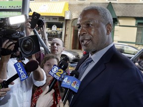FILE - In this April 11, 2017, file photo, former New York Knicks star Charles Oakley talks to the press after an appearance in Manhattan Criminal Court, in New York. Oakley has reached a deal with prosecutors who charged him with striking a security guard at Madison Square Garden. The Daily News reports, Friday, Aug. 4, 2017, that charges against Oakley will be dismissed and sealed after six months of good behavior. (AP Photo/Richard Drew, File)