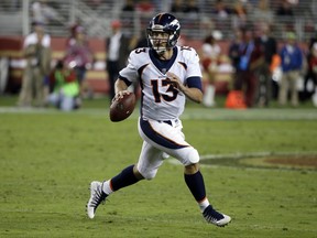 File-This Aug. 19, 2017, file photo shows Denver Broncos quarterback Trevor Siemian (13) running against the San Francisco 49ers during the second half of a preseason NFL football game in Santa Clara, Calif. Siemian, who considered going into real estate when his college career ended on crutches, has spent three consecutive summers forcing the Denver Broncos to rethink their roster plans. (AP Photo/Eric Risberg, File)