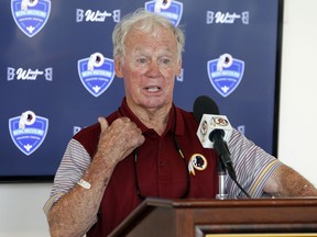 File-This July 30, 2016, file photo shows former Redskins GM Bobby Beathard, gesturing during a press conference at the Washington Redskins NFL football teams training camp in Richmond, Va. Beathard is a finalist for the Pro Football Hall of Fame in the contributors category. Beathard helped build strong teams in football stops in Kansas City (1966-67), Miami  (1972-77), Washington (1978-1988) and San Diego  (1990-99). He also worked for the Atlanta Falcons  (1968-1971). (AP Photo/Steve Helber, File)