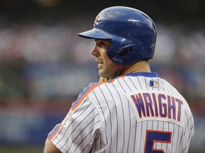 FILE - In this May 27, 2016, file photo, New York Mets'  David Wright stands on the field during the first inning of a baseball game against the Los Angeles Dodgers, in New York. Wright has started a rehab assignment with Class A St. Lucie. Wright was the designated hitter and batted third Tuesday night, Aug. 22, 2017, at Charlotte, a Tampa Bay Rays affiliate in the Florida State League. Trying to come back from neck surgery last year, the third baseman hasn't played in a major league game since May 2016. (AP Photo/Frank Franklin II, File)