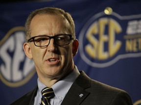 FILE - In this March 13, 2015, file photo, Southeastern Conference Commissioner Greg Sankey speaks before an NCAA college basketball game in Nashville, Tenn. Nate Northington feels satisfaction every time he watches a Southeastern Conference football game and sees African-Americans playing significant roles on the field, on the sidelines and as administrators. Sankey said in a lengthy speech during SEC media days that by playing in that football game, "Nate Northington affected us all. This network of mutuality involves more than the four football players at Kentucky, more than just one date, one sport, one team, or one university.(AP Photo/Mark Humphrey, File)