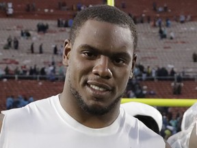 FILE - This is a Nov. 20, 2016, file photo, shows Los Angeles Rams defensive tackle Dominique Easley after an NFL football in Los Angeles. A person with knowledge of the situation says Los Angeles Rams' Dominique Easley is expected to miss the season with a torn knee ligament. The source spoke to The Associated Press on condition of anonymity on Wednesday, Aug. 2, 2017,  because the Rams hadn't announced the severity of the injury for Easley, a likely starter this season. (AP Photo/Jae C. Hong, File)