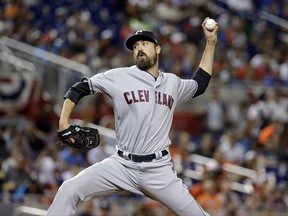 FILE - In this Tuesday, July 11, 2017 file photo, American League's Cleveland Indians pitcher Andrew Miller throws a pitch, during the MLB baseball All-Star Game in Miami. The Cleveland Indians have placed All-Star reliever Andrew Miller on the disabled list with right knee tendinitis. Miller is one of baseball's best late-innings pitchers and he's one of the most important players for the defending AL champions. He has been uncharacteristically wild of late, walking 10 batters in the past 21 innings. (AP Photo/Lynne Sladky, File)