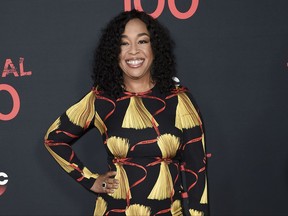 FILE - In this April 8, 2017, file photo, Shonda Rhimes attends the "Scandal" 100th Episode Celebration at Fig & Olive in West Hollywood, Calif. Netflix announced late Sunday, Aug. 13, that Rhimes and her company Shondaland had agreed to produce new series and context for the streaming service. Rhimes' current hit shows, "Grey's Anatomy," "Scandal" and "How to Get Away With Murder," will continue to air on ABC. (Photo by Richard Shotwell/Invision/AP, File)