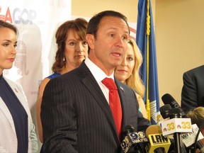 FILE - In this Tuesday, July 28, 2015, file photo, Republican candidate for attorney general, Jeff Landry, speaks about the state GOP's endorsement of his campaign in Baton Rouge, La. Lawyers for Louisiana's governor and attorney general are heading back to court to argue the constitutionality of an order aimed at protecting LGBT rights in state government. Landry challenged the order as executive overreach and won in district court. Arguments are set for Tuesday, Aug. 15, 2017. (AP Photo/Melinda Deslatte, File)