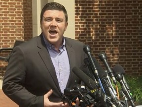 In this frame from video, Jason Kessler, a blogger based in Charlottesville, Va., speaks to the media on Sunday, Aug. 13, 2017. Kessler, who organized the rally in Charlottesville on Saturday that sparked violent clashes between white supremacist groups and counter-protesters tried to hold a news conference, but a crowd booed him and forced him away from the lectern. (AP Photo)