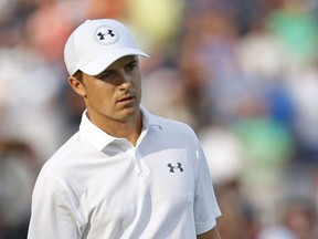 Jordan Spieth reacts to his putt on the 18th green during the final round of The Northern Trust golf tournament on Sunday, Aug. 27, 2017, in Old Westbury, N.Y. (AP Photo/Adam Hunger)