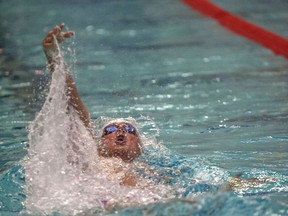 Ryan Lochte swims on the way to a fifth-place finish in the men's 100-meter backstroke Saturday, Aug. 5, 2017, at the U.S. Open in East Meadow, N.Y. (Richard T. Slattery/Newsday via AP)