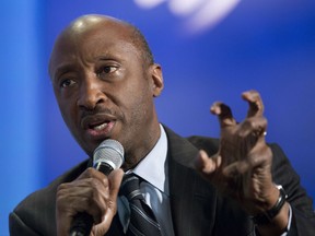 FILE - In this Sunday, Sept. 27, 2015, file photo, Merck Chairman and CEO Kenneth Frazier participates in a session "The Future of Impact,"  at the Clinton Global Initiative in New York. Frazier is resigning from the President's American Manufacturing Council citing "a responsibility to take a stand against intolerance and extremism." Frazier's resignation comes shortly after a violent confrontation between white supremacists and protesters in Charlottesville, Va. U.S. President Donald Trump is being criticized for not explicitly condemning the white nationalists who marched in Charlottesville. (AP Photo/Mark Lennihan, File)