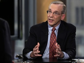 FILE - In this May 20, 2014, file photo, New York Federal Reserve President William Dudley is interviewed by Peter Barnes on the Fox Business Network, in New York. In an interview with The Associated Press, Dudley indicated that the Fed will likely make an announcement at its September 2017 meeting that it is ready to start reducing its massive bond portfolio, a move expected to put upward pressure on long-term interest rates including home mortgages. (AP Photo/Richard Drew, File)