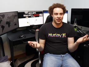 FILE - In this Monday, May 15, 2017, file photo, British IT expert Marcus Hutchins speaks during an interview in Ilfracombe, England. Hutchins, a young British researcher credited with derailing a global cyberattack in May, has been arrested for allegedly creating and distributing banking malware, U.S. authorities say. Hutchins was detained in Las Vegas on Wednesday, Aug. 2, 2017, while flying back to Britain from Defcon, an annual gathering of hackers of IT security gurus. A grand jury indictment charges Hutchins with "creating and distributing" malware known as the Kronos banking Trojan. (AP Photo/Frank Augstein, File)